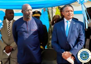 President Weah standing with Mr  Yacoub El Hillo the  UN Resident Coordinator for LiberiaExecutive Mansion