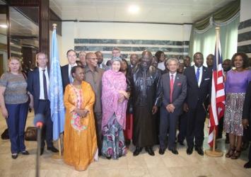 Group photo following the media stakeout in the Foyer of the Ministry of Foreign AffairsExecutive Mansion Photo