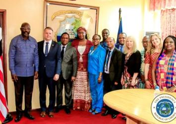 Pres. Weah. Mercy Ship CEO,  Donovan Palmer in group photoExecutive Mansion