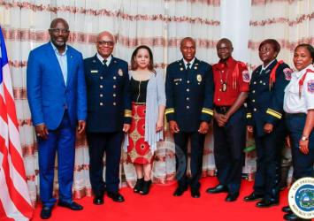 President Weah and Liberian Fire Service Leaders pose with US Fire Marshall and his wife following the meetingEXECUTIVE MANSION