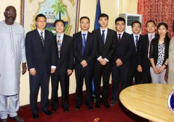 President Weah and Minister McGill pose with Chinese DelegationEXECUTIVE MANSION