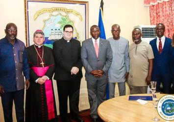 President Weah and Officials pose with Apostolic Nuncio and teamEXECUTIVE MANSION