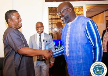 President Weah greets Representative-Elect Edward Papay Flomo at his Foreign Affairs officeEXECUTIVE MANSION