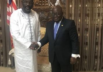President Weah in handshake with Ghanaian President Nana Ado Dankwa Akufo-AddoExecutive Mansion Photo