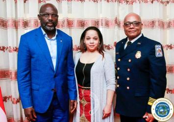 President Weah poses with US Fire Marshall and Mrs. Butler (US Fire Marshall Wife)EXECUTIVE MANSION