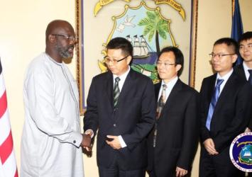 President Weah shake hands with head of Chinese DelegationEXECUTIVE MANSION