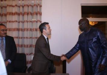 President Weah shakes hand with Mr. Ary Bobrow, Country Director of UNOPSExecutive Mansion Photo